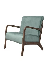 Низкое кресло с деревянными подлокотниками Mody Green в интерьере в Санкт-Петербурге